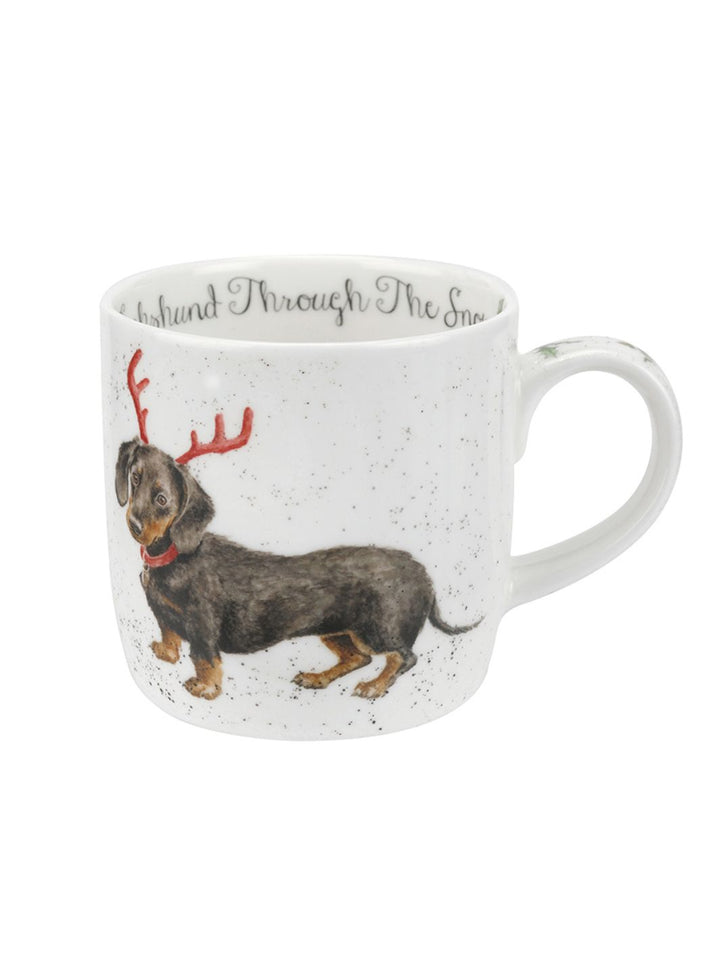 Dackel mit Geweih auf einer weihnachtlichen Tasse von Wrendale Designs.