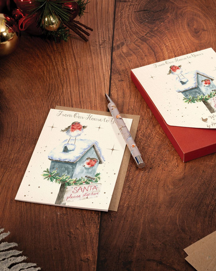Doppelkarte mit weihnachtlichem Vogelhaus und Rotkehlchen Motiv von Wrendale Designs.