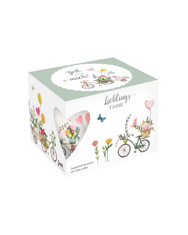 Auch die hübsche Geschenkverpackung zeigt die Motive der Lieblingstasse Auf ins Glück vom Grätz Verlag.