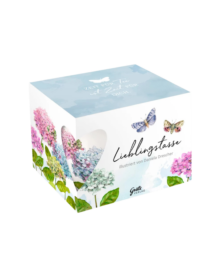Geschenkverpackung mit der Lieblingstasse "Hortensien" vom Grätz Verlag. Auf dem Deckel steht: Zeit für Tee ist Zeit für dich.