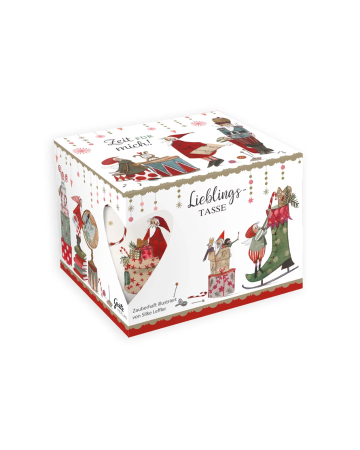 Geschenkverpackung der Lieblingstasse „Weihnachtswerkstatt“ vom Grätz Verlag mit Wichtel-Motiven und Aufschrift „Zeit für mich!“.