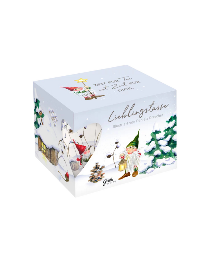 Geschenkverpackung der Lieblingstasse Weihnachtswichtel vom Grätz Verlag Motiv vor weißem Hintergrund.