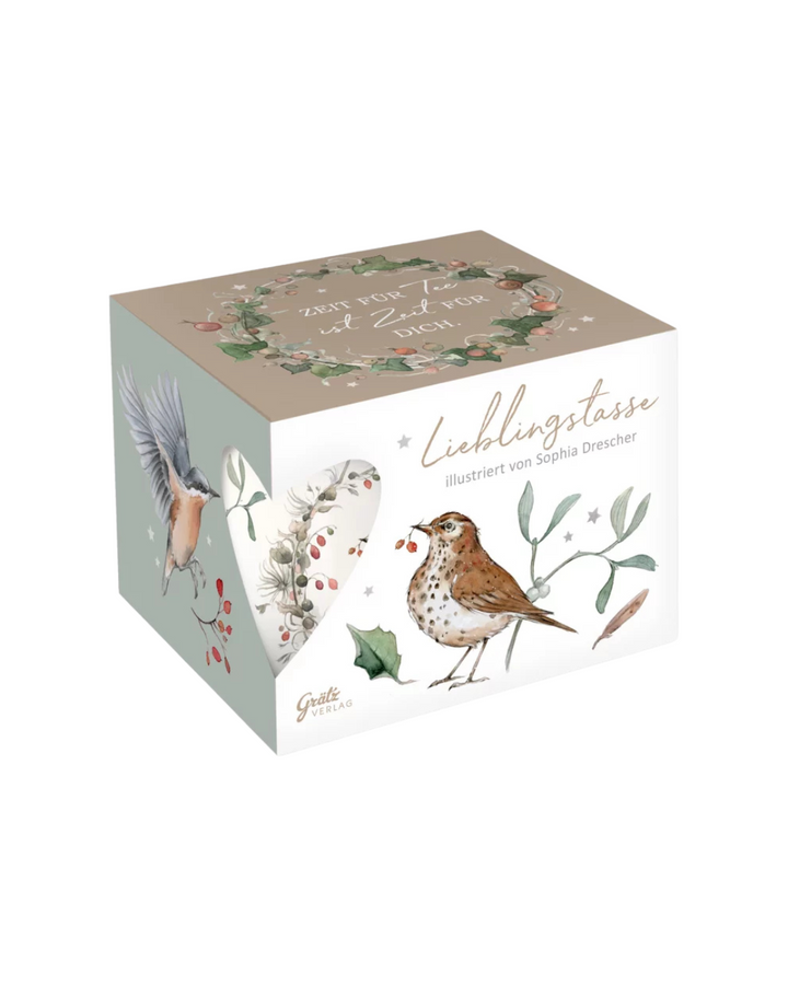 Geschenkverpackung der Winterkränze Lieblingstasse vom Grätz Verlag vor weißem Hintergrund. Auf dem Deckel steht: Zeit für Tee ist Zeit für dich.