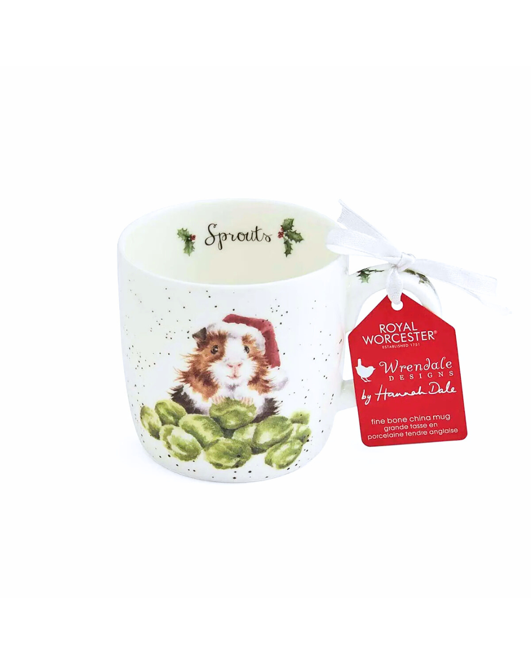 Porzellantasse mit Meerschweinchen-Motiv von Wrendale Designs vor weißem Hintergrund. Innen steht „Sprouts“ und die Vorderseite zeigt ein Meerschweinchen, das zwischen Rosenkohl sitzt und eine Weihnachtsmütze auf dem Kopf hat.