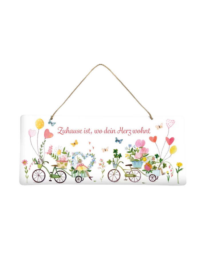 Metallschild Auf ins Glück vom Grätz Verlag mit bunt illustrierten Fahrrädern und Blumen auf weißem Hintergrund, Aufhängung mit Juteband.