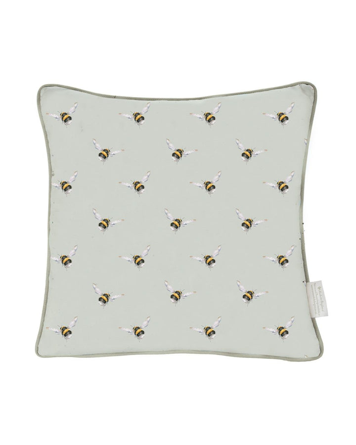Rückseite des Kissens in hellgrün mit vielen kleinen Hummeln drauf von Wrendale Desigsn.