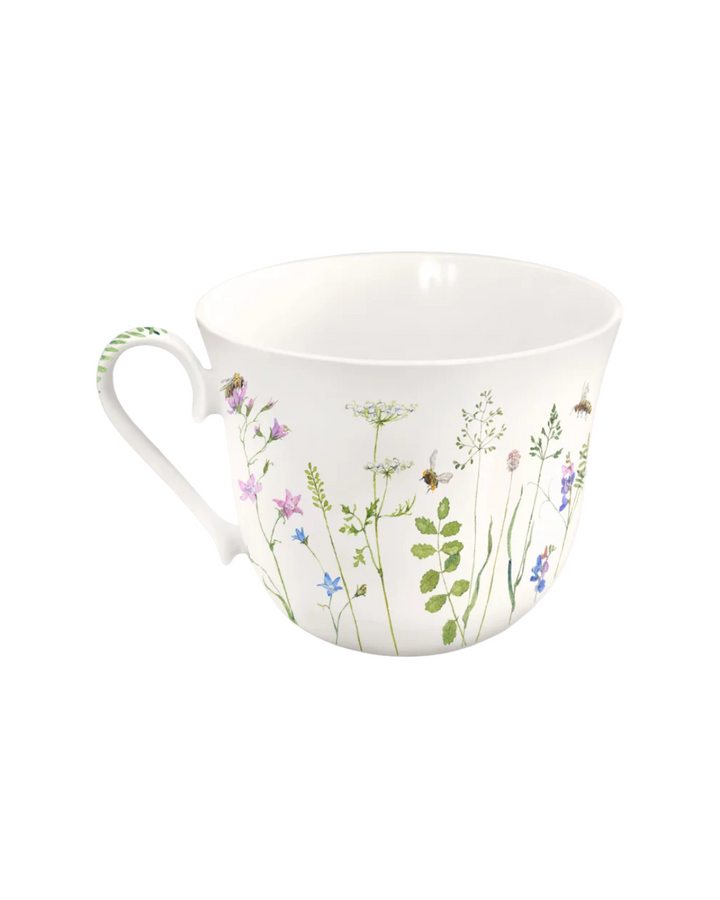 Die Rückseite der Lieblingstasse Bienen vom Grätz Verlag zeigt ebenfalls eine Blumenwiese mit Bienen von Daniela Drescher.