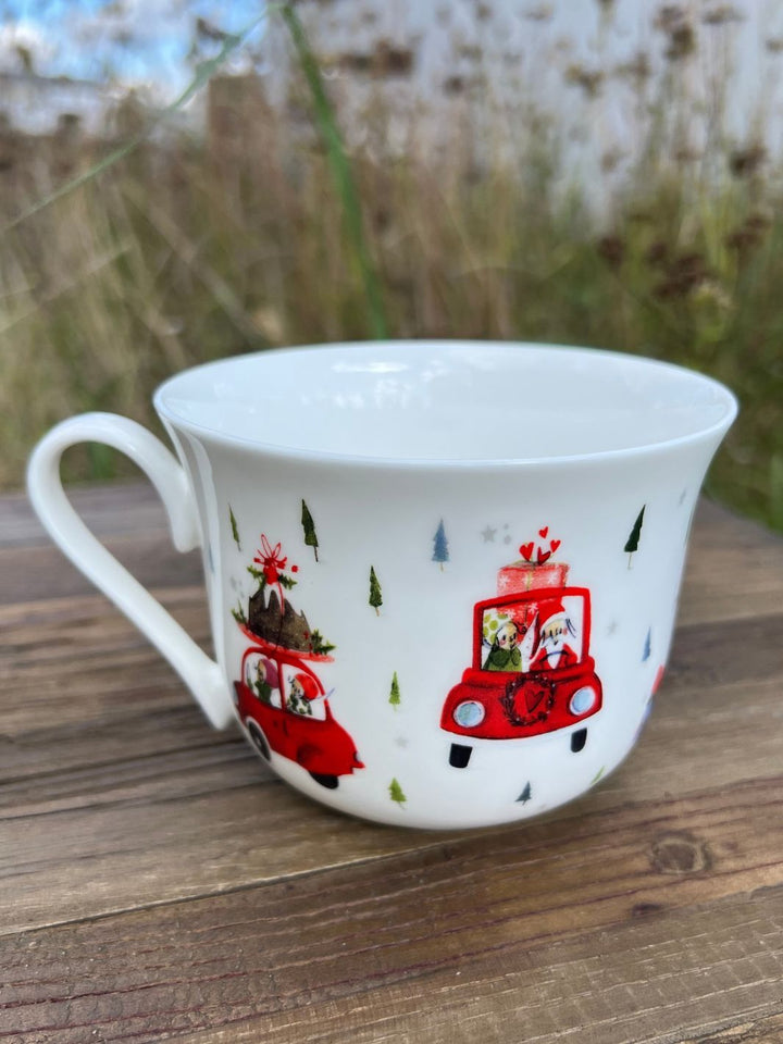 Rückseite der Lieblingstasse mit der illustrierten Weihnachtsauto Abbildung vom Grätz Verlag.