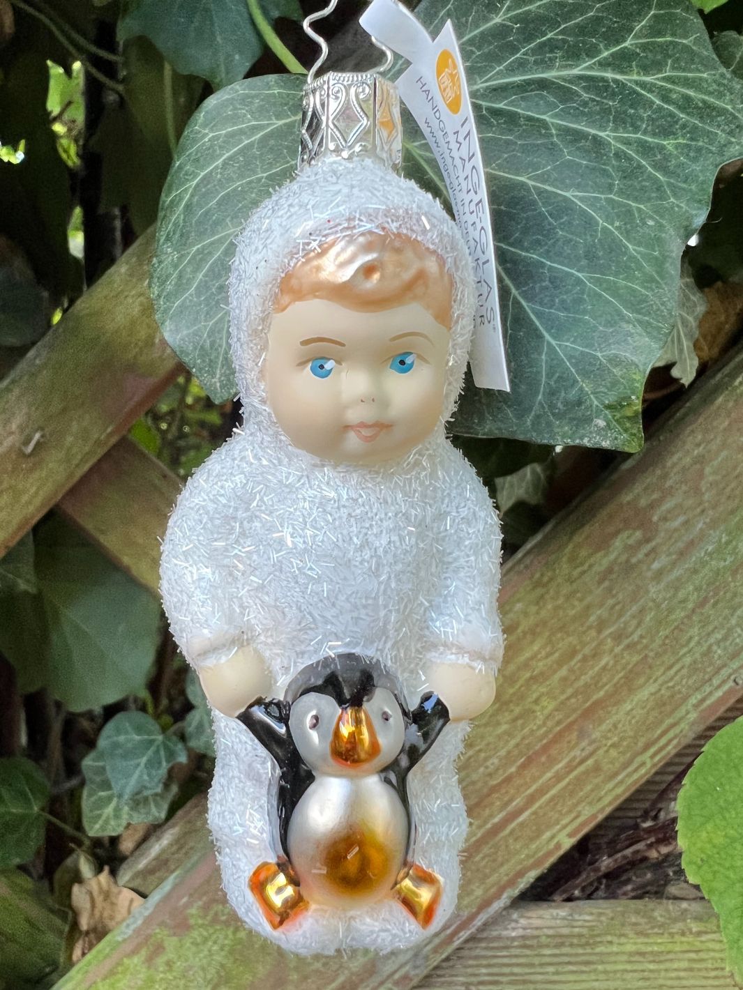 Schneekind mit Pinguin Inge Glas