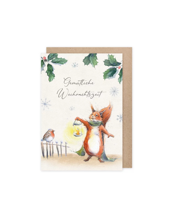 Weihnachtskarte vom Grätz Verlag mit Eichhörnchen, Laterne und Rotkehlchen.