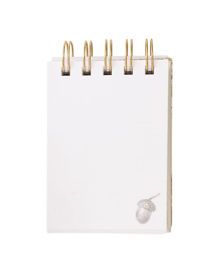 Blanco Innenseite des Mini Notiz- und Skizzenbuchs „Woodland“ mit dezenter Illustration.