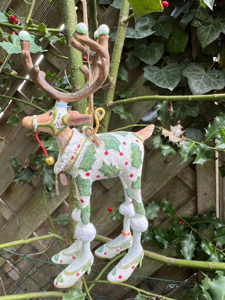 Festliches Dash Away Vixen Krinkle. Prachtvolles Rentier mit Ilex Muster