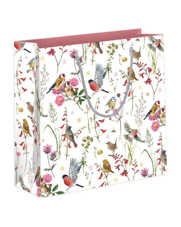 Große Geschenktasche „Zeit für Harmonie“ von Grätz Verlag mit weitläufigem Vogel- und Blumenmuster, zarte Farben, graue Tragekordeln und harmonische Gesamtwirkung.