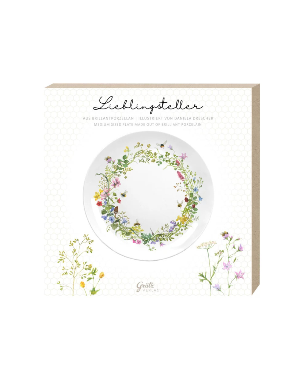 Geschenkverpackung des Frühstückstellers Wilde Bienen mit floralen Motiven und Illustrationen von Daniela Drescher vor weißem Hintergrund.