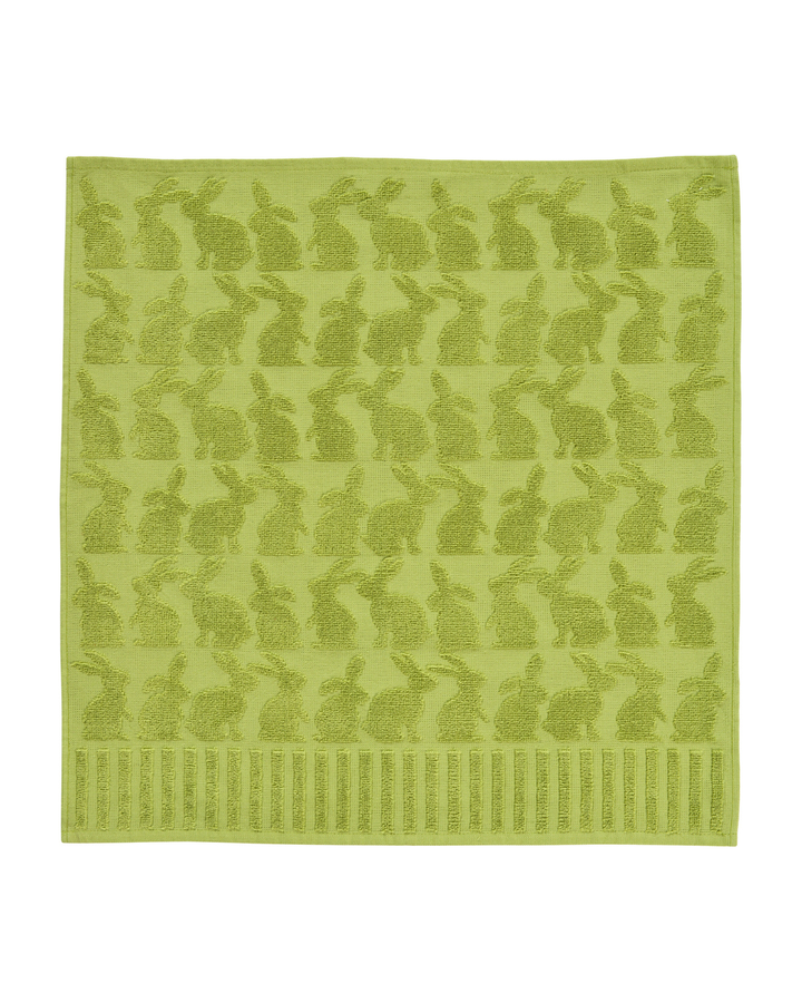 Grünes Frottiertuch „Pascha“ von Sander mit erhabener Hasenstruktur, vollständig sichtbar und flach ausgelegt vor weißem Hintergrund.
