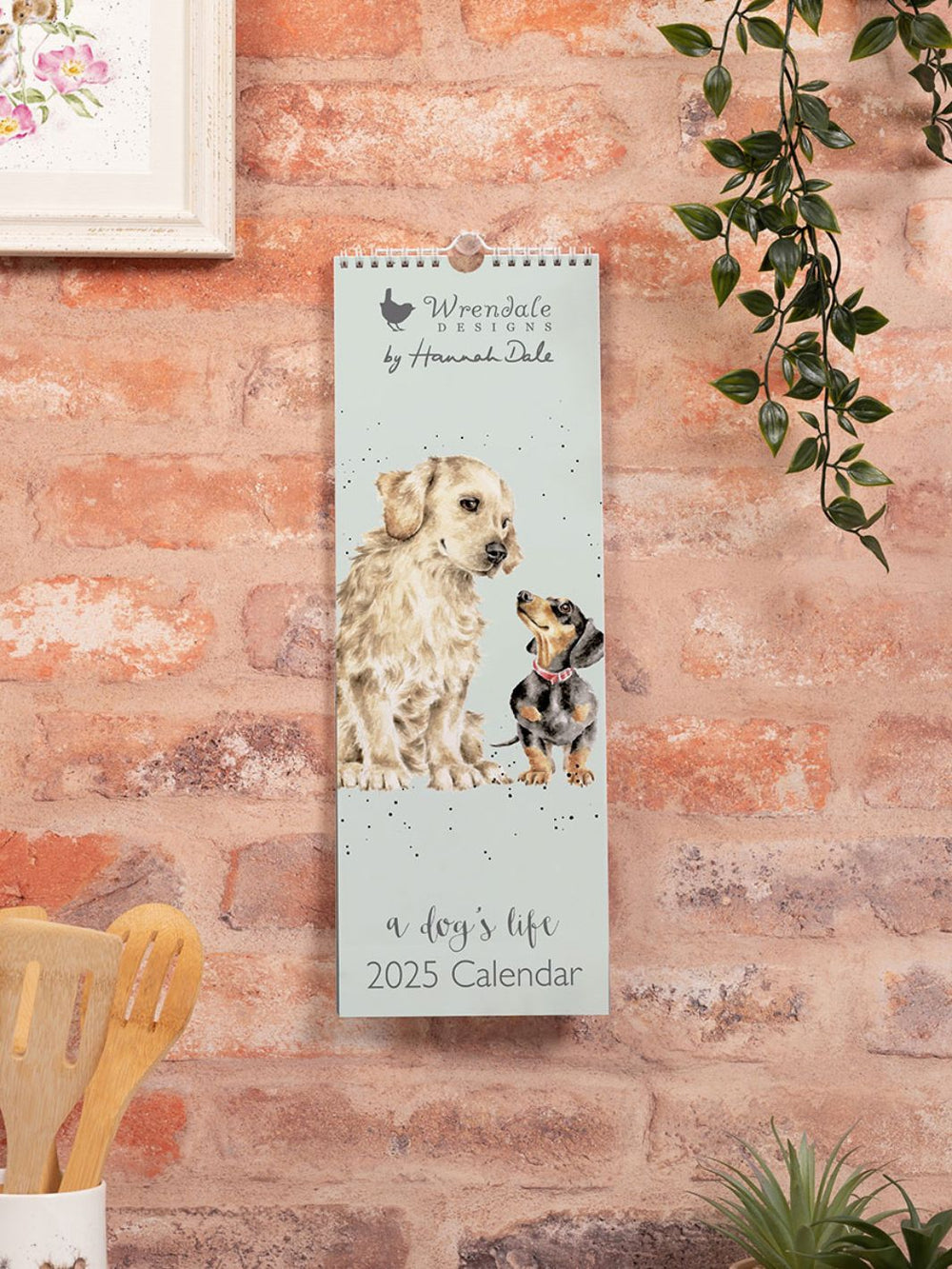 Hunde Wandkalender von Wrendale Designs.