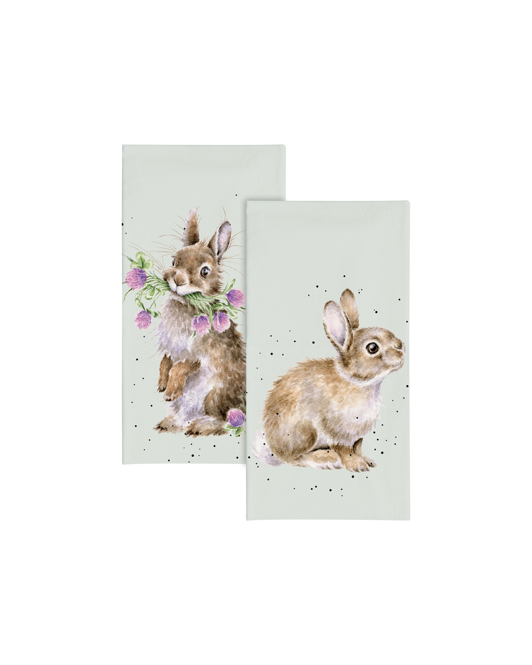 Zwei Kaninchen-Taschentücher von Wrendale Designs mit Illustrationen von Hannah Dale: ein Kaninchen mit lila Blumen im Maul und ein sitzendes Kaninchen – beide auf sanft graugrünem Hintergrund; die Taschentücher liegen vor weißem Hintergrund.