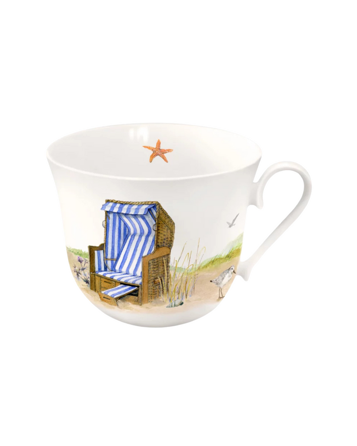 Lieblingstasse Strandkorb vom Grätz Verlag mit einem Strand-Motiv vor weißem Hintergrund.