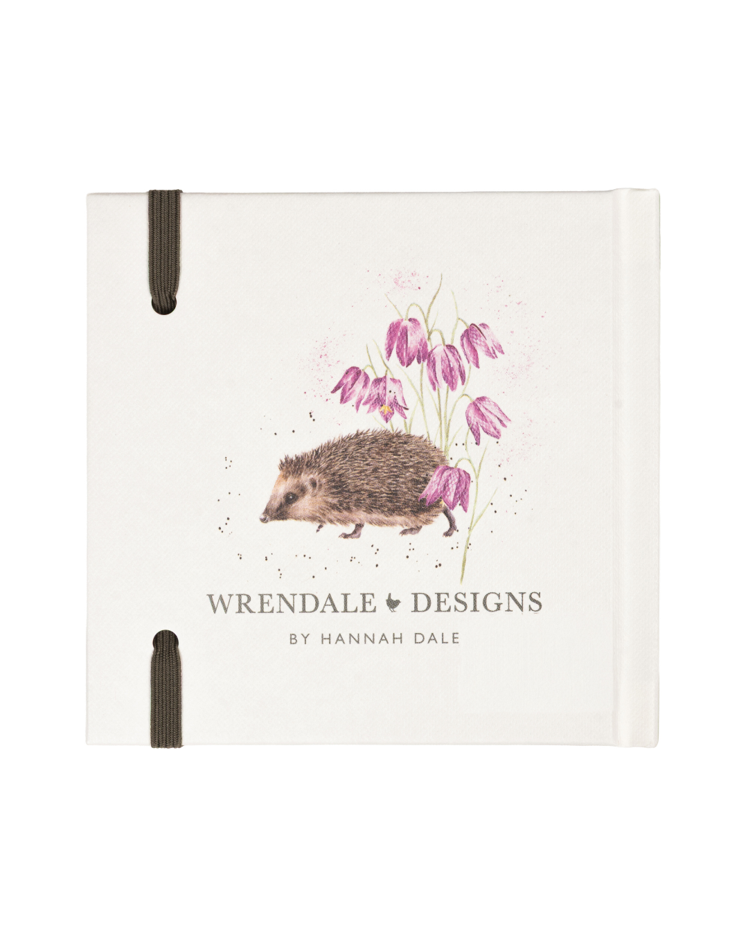 Die Rückseite des Mini Igel Notizbuch zeigt einen gehenden Igel von der Seite. Der Igel läuft zwischen Blumen mit magentafarbenen Blüten.