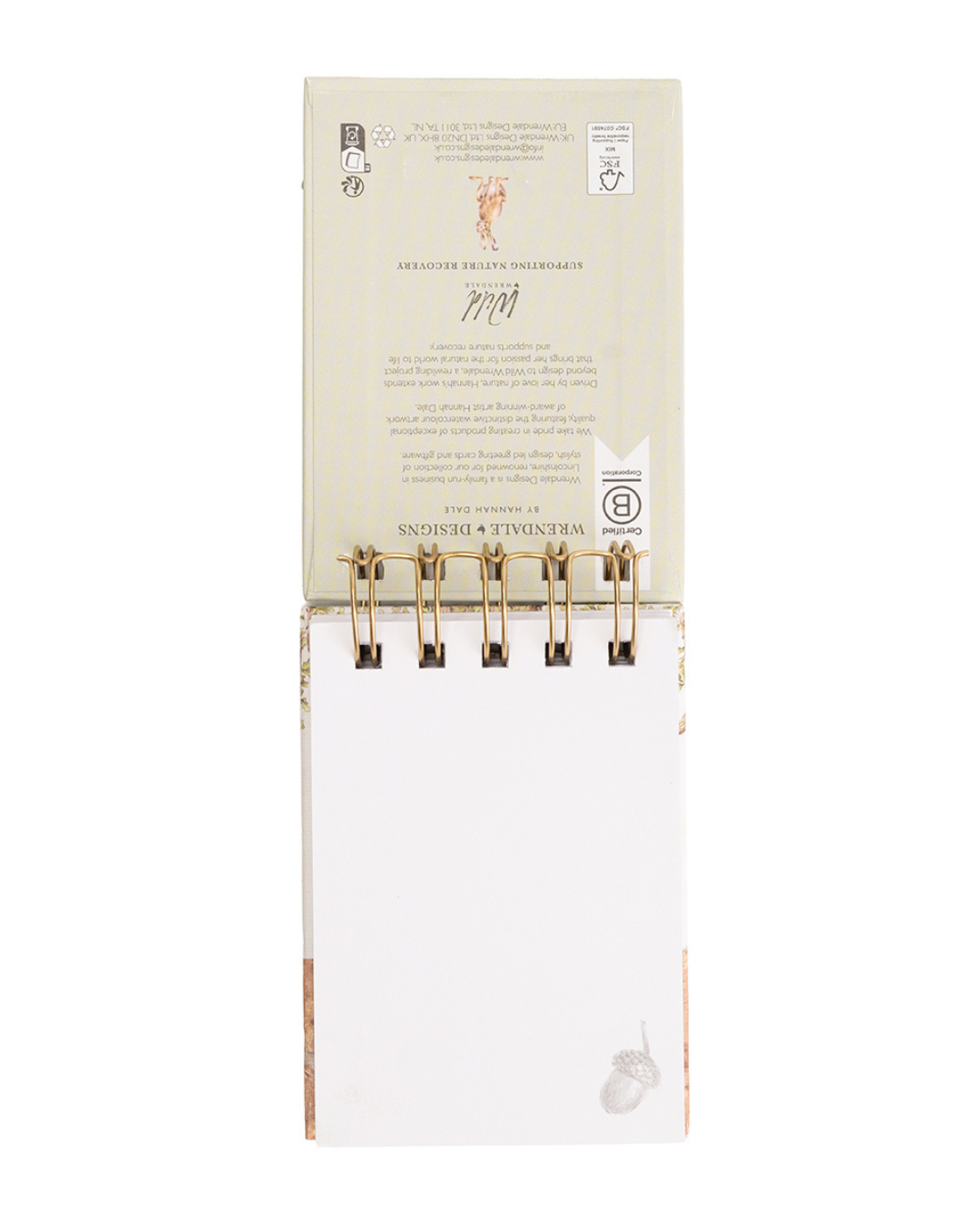 Aufgeschlagenes Mini Notiz- und Skizzenbuch „Woodland“ mit blanco Seiten und kleinen Waldmotiven.