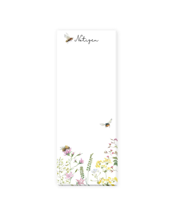 Detailansicht des Notizblocks „Bienen“ vom Grätz Verlag mit floralem Randmotiv und kleiner Biene auf weißem Hintergrund, Illustration von Daniela Drescher.