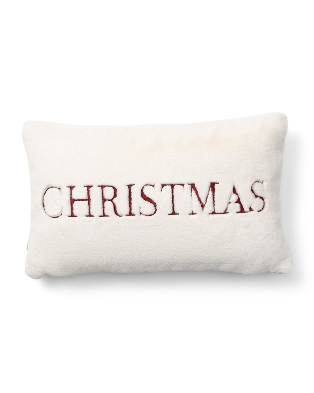 Rückseite des Kissenbezugs mit der Stickerei „CHRISTMAS“ in Rot