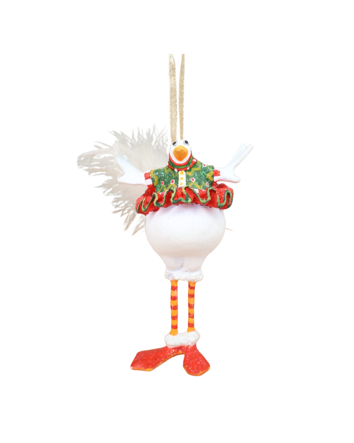 „Mini Snowbird Bernice von Patience Brewster – weißer Schneevogel mit rotem Rock, grünem Musterkragen und gestreiften Beinen, frontal gezeigt.“