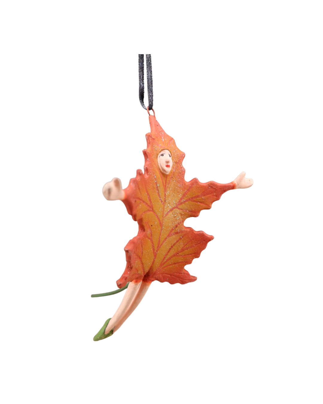 Schrägansicht der Figur Mini Orange Falling Leaf, glitzerndes Herbstblatt mit rostroten und goldenen Details und eingebettetem Gesicht.