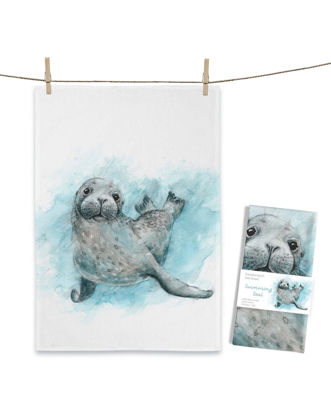 Geschirrtuch „Swimming Seal“ von Maluu mit schwimmendem Seehund in Blau