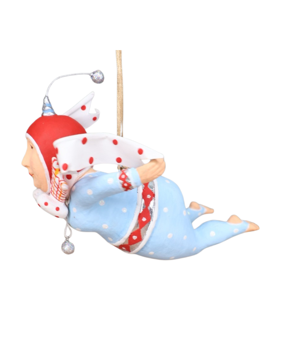 „Seitliche Ansicht der Krinkle Fallschirmspringerin Faith mit gepunkteten Flügeln und blauem Outfit.“