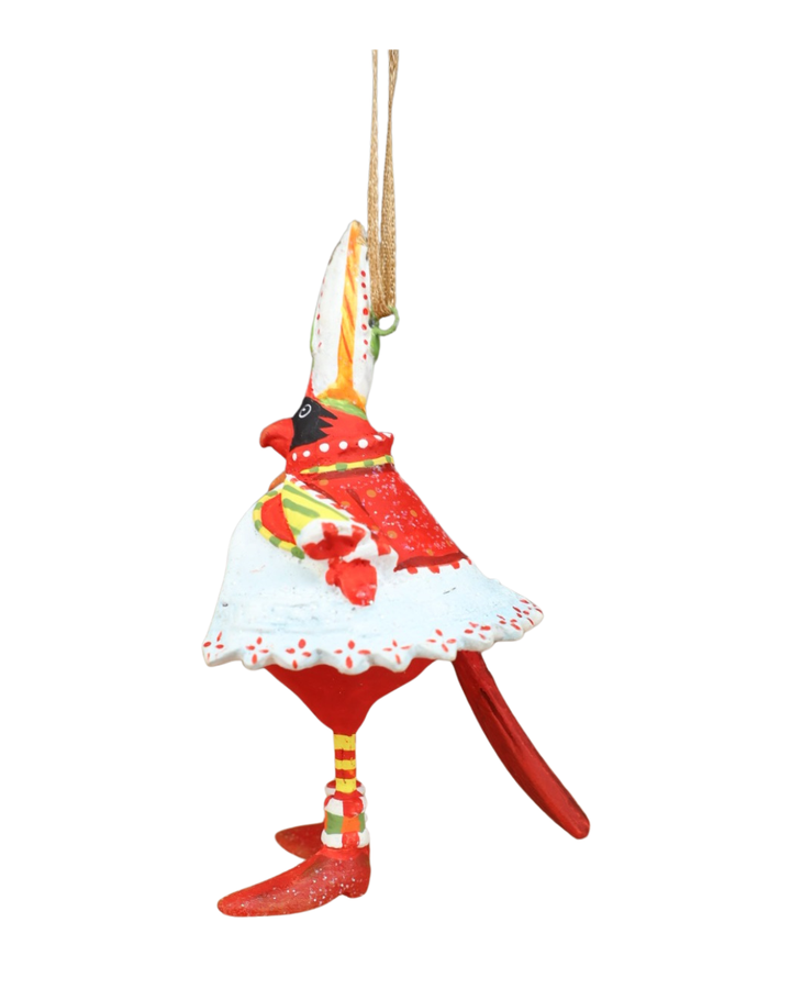 „Seitliche Ansicht des Mini Cardinal Krinkles mit detaillierter Bemalung und festlicher Kopfbedeckung.“