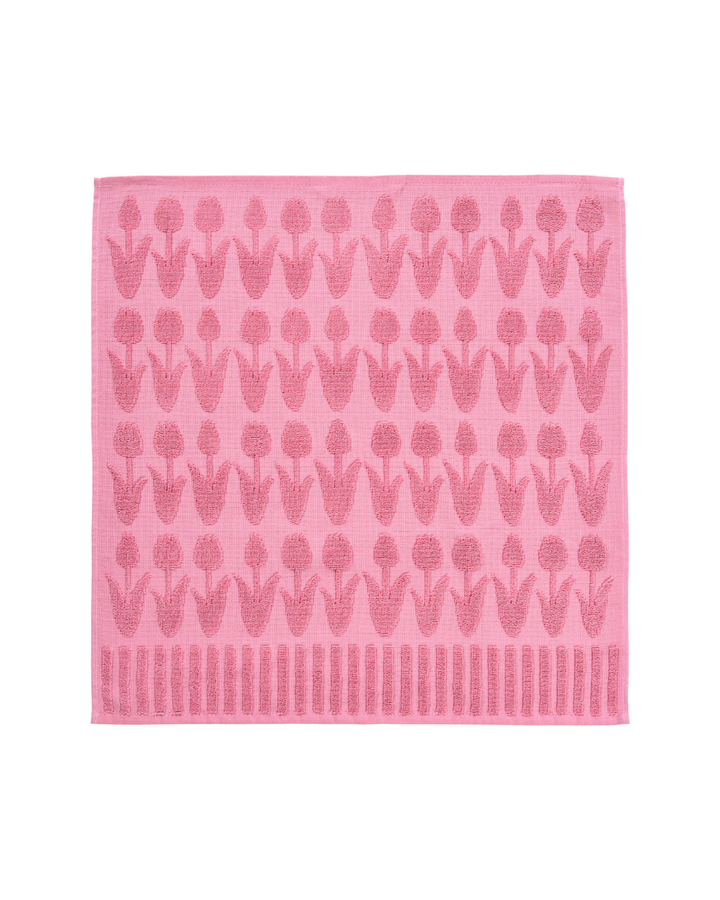 Rosa Frottiertuch Primavera von Sander mit plastisch gewebtem Tulpenmotiv und strukturierter Oberfläche.
