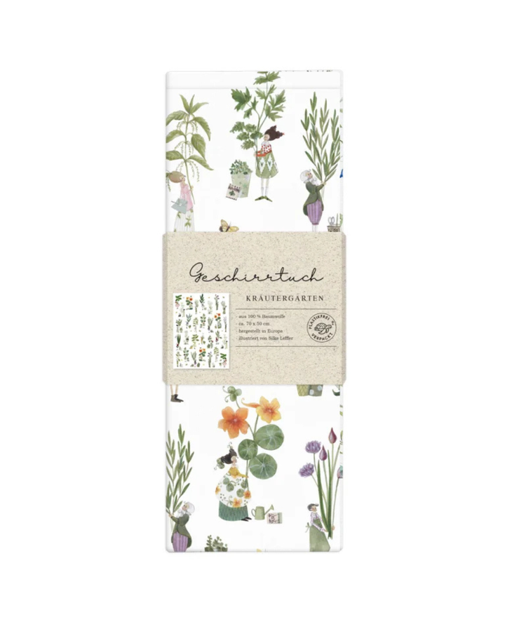 Gefaltetes Geschirrtuch „Kräutergarten“ vom Grätz Verlag mit Papierbanderole und sichtbarem Kräutermotiv