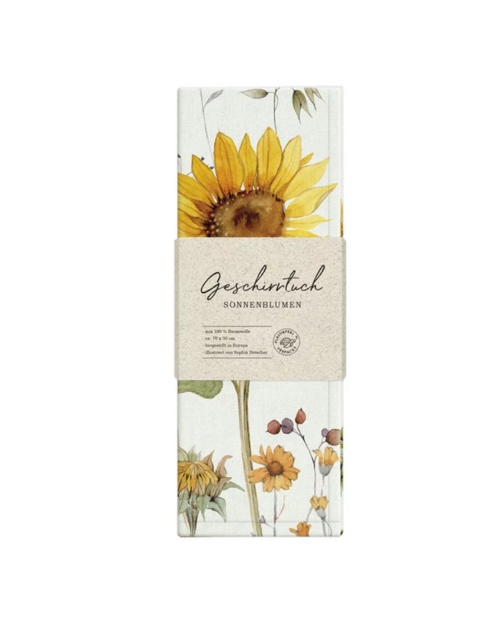 Sonnenblumen Geschirrtuch von Sophia Drescher illustriert mit Verpackung vor weißem Hintergrund. Herstellung aus Baumwolle vom Grätz Verlag.