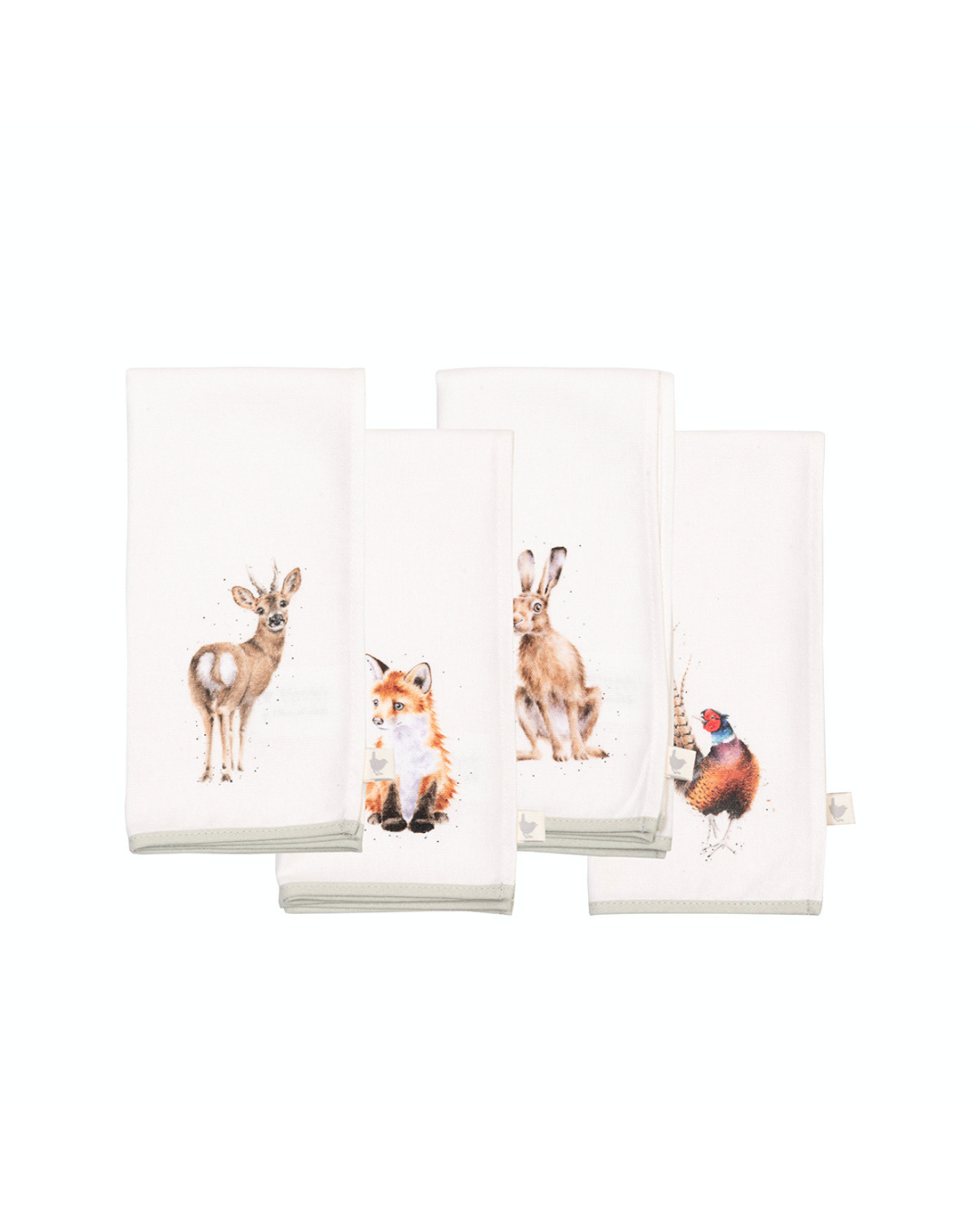 Vier Servietten „Woodlanders“ mit zarten Waldmotiven. Jede Serviette zeigt ein anderes Tier: ein Fuchs, ein Hase, ein Reh und ein Fasan, alle in natürlichen Farben auf cremefarbenem Hintergrund.